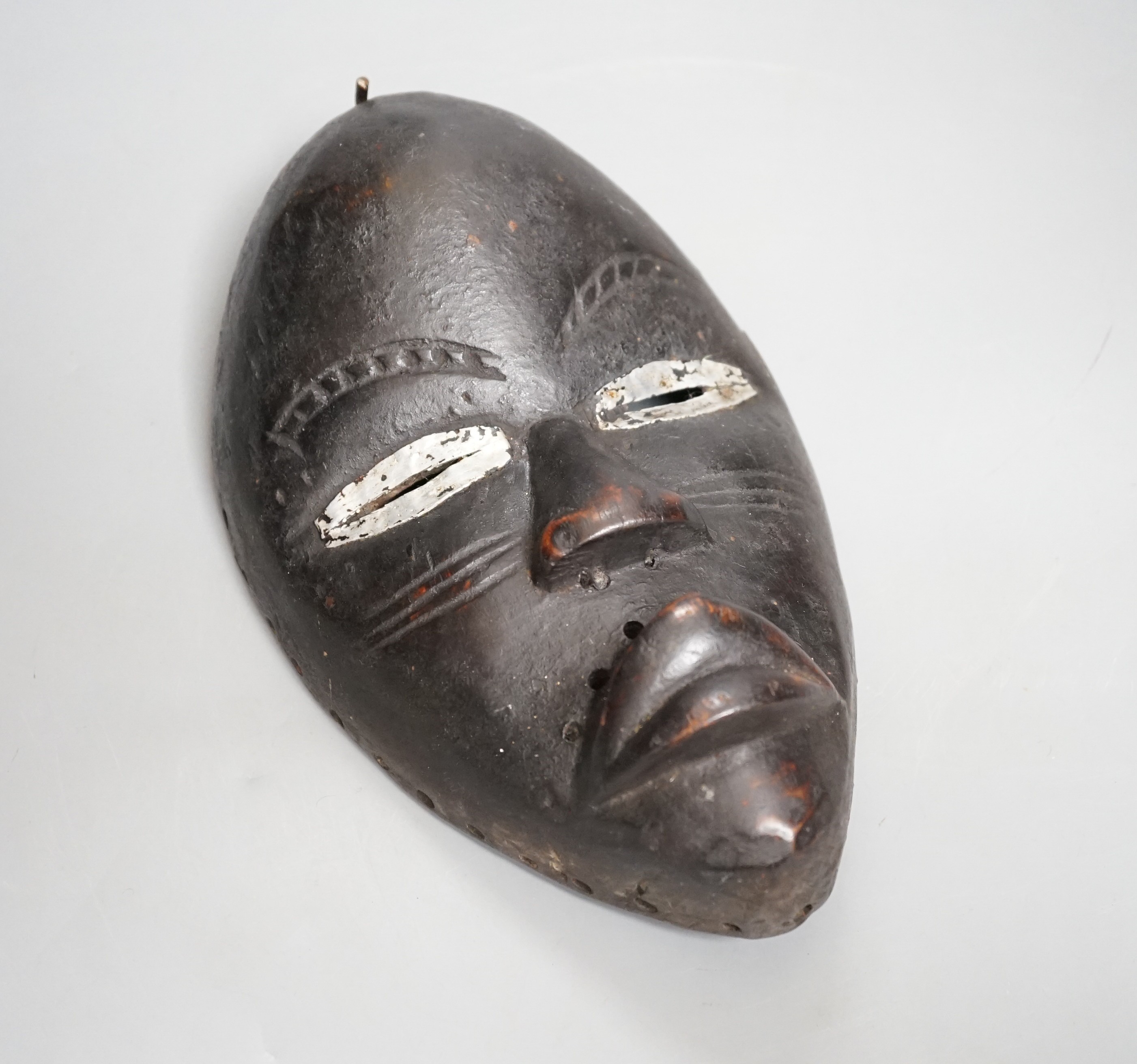 A Liberian Dan tribal mask (racing) 23cm